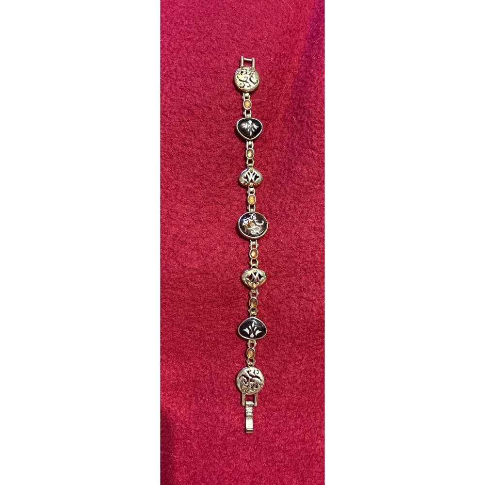 Gold-tone Vtg Scroll Charm Bracelet w/ Black Enamel, Yellow Crystal Accents 7.5”